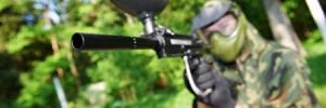 Paintball Player with paintball gun and other equipment