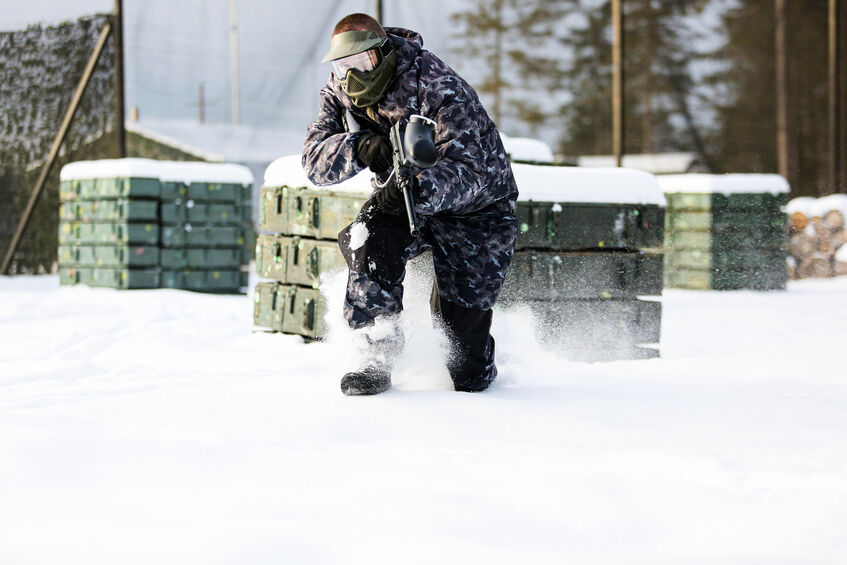 Paintball player in the winter season